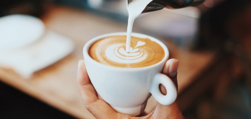 person making latte art