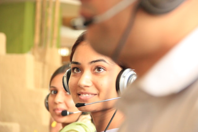 woman in black headphones