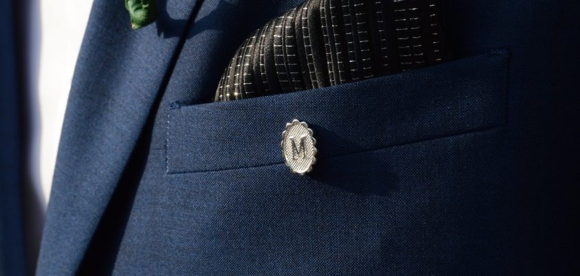 Silver-colored M Lapel Pin